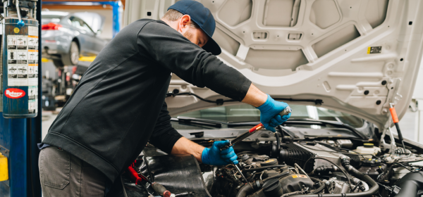 Mountain View mechanic inspects VW engine and performs oil change during routine maintenance.